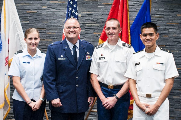 Receiving AFCEA International awards from Col. Joseph A. Sublousky, USAF, chapter president, at the University of South Carolina in April are Cadet Ashley N. Zapp, Air Force ROTC; Cadet Justin A. Adams, Army ROTC (2nd from r); and Midshipman Larry W. Pineda, Navy ROTC